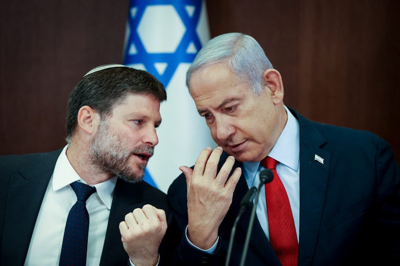 Israeli Finance Minister Bezalel Smotrich speaks with Israeli Prime Minister Benjamin Netanyahu at a Cabinet meeting at the Prime Minister's Office in Jerusalem, on June 18, 2023. Photo by Amit Shabi/POOL. Israeli Finance Minister Bezalel Smotrich speaks with Israeli Prime Minister Benjamin Netanyahu at a Cabinet meeting at the Prime Minister's Office in Jerusalem, on June 18, 2023. Photo by Amit Shabi/POOL.