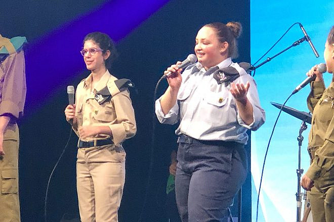 Adi Yehuda (blue uniform, center) and the Special in Uniform band perform their 500th show, at the Zappa Club in Tel Aviv, June 2023. Credit: Judy Lash Balint