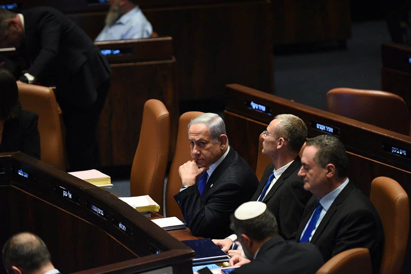 Israeli Prime Minister Benjamin Netanyahu and, from left, Justice Minister Yariv Levin, Energy Minister Israel Katz and National Security Minister Itamar Ben-Gvir (with his back to the camera) attend the votes at the Knesset on proposed changes to the "reasonableness bill," July 24, 2023. Photo by Yoav Dudkevitch/TPS.