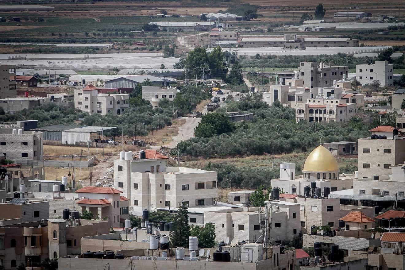 Israeli military vehicles seen during clashes between Israeli security forces and Palestinians in Jenin on June 19, 2023. Photo by Nasser Ishtayeh/Flash90.