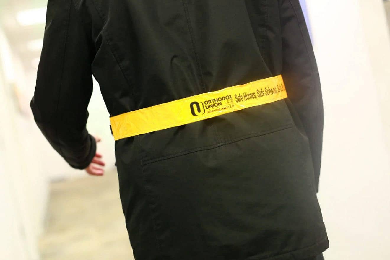 A reflective belt to protect congregants wearing dark clothing while walking home at night from synagogue. Courtesy: Orthodox Union.