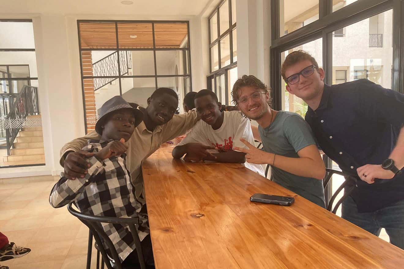 Agahozo-Shalom Youth Village teens and OU Relief Missions participants Raphael Blumenthal and Matan Schwartz.