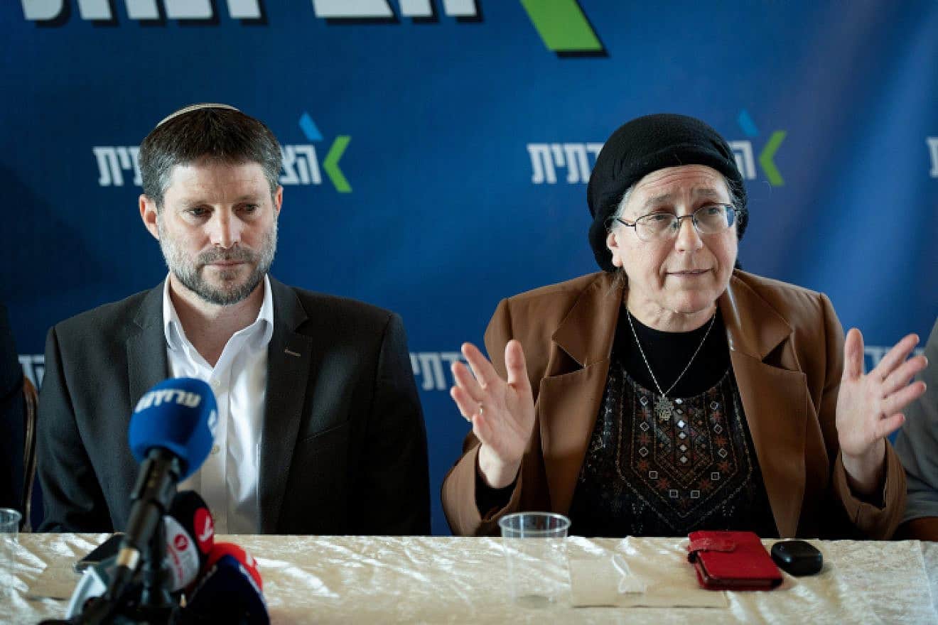 Israeli Finance Minister Bezalel Smotrich and National Mission Minister Orit Strock attend a Religious Zionism Party faction meeting at the Givat Harel outpost in Samaria, Feb. 14, 2023. Photo by Sraya Diamant/Flash90.