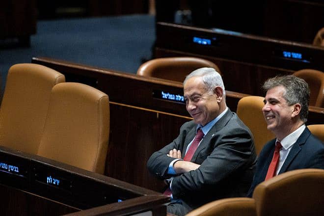 Prime Minister Benjamin Netanyahu with Foreign Minister Eli Cohen at the Knesset in Jerusalem, March 13, 2023. Photo by Yonatan Sindel/Flash90.