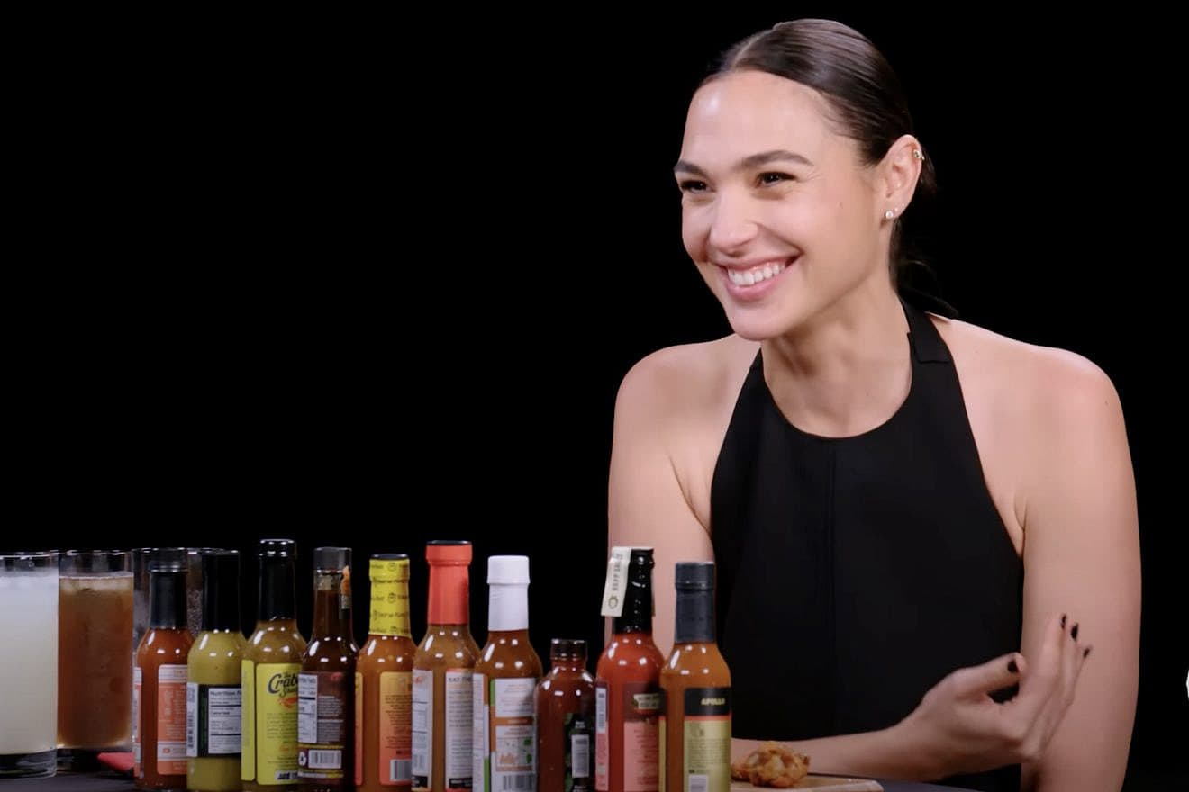 Israeli actress Gal Gadot early on in a 10 spicy chicken-wing interview on the show “Hot Ones.” Source: YouTube.