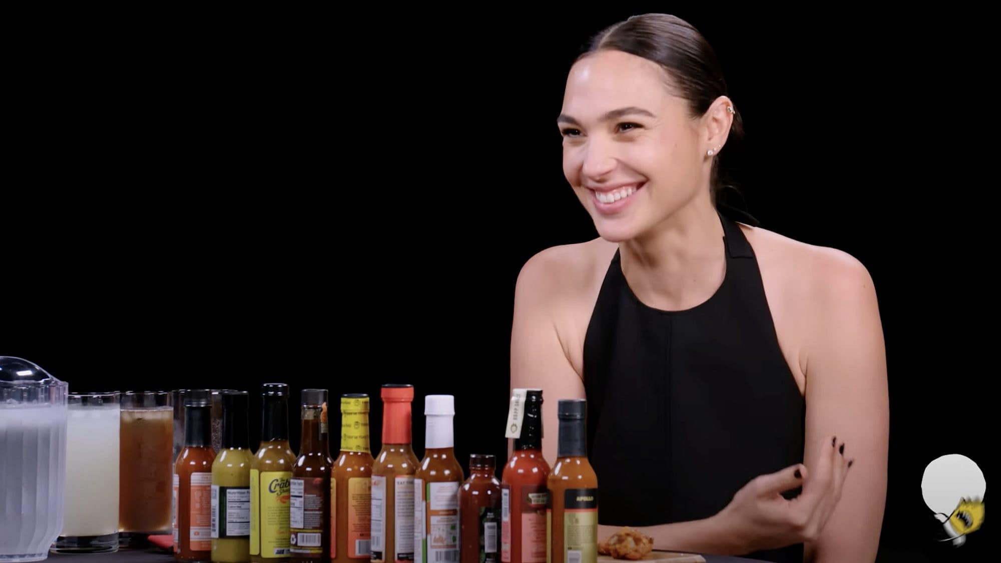 Israeli actress Gal Gadot early on in a 10 spicy chicken-wing interview on the show “Hot Ones.” Source: YouTube.