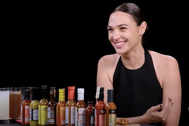 Israeli actress Gal Gadot early on in a 10 spicy chicken-wing interview on the show “Hot Ones.” Source: YouTube.