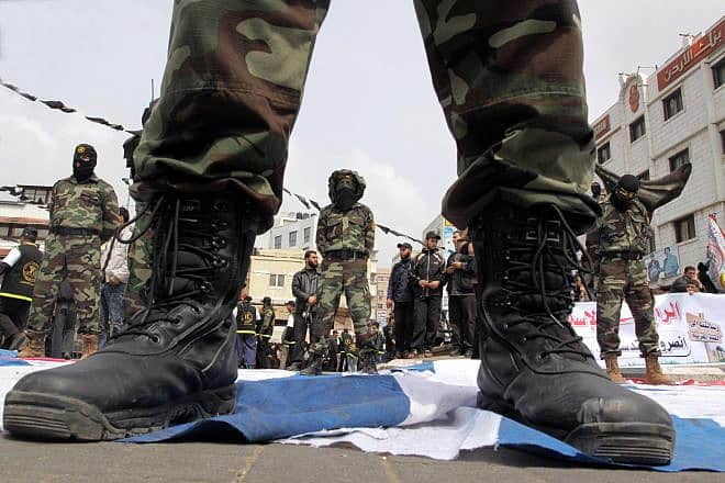 During an Arab League summit in Libya, Palestinian Islamic Jihad militants in the Gaza Strip take part in a rally calling for Arab leaders to cancel an initiative for indirect peace talks with Israel, March 27, 2010. Photo by Abed Rahim Khatib/Flash 90.