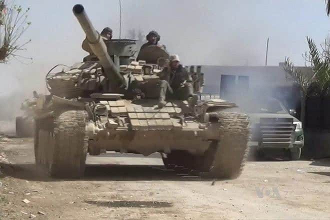 A Syrian Army T-72 tank during the 2018 Rif Dimashq offensive. Source: Wikimedia Commons.