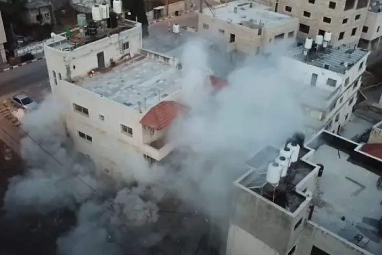 The partial demolition of the home of terrorist Moataz al-Khawaja in May. Credit: IDF.