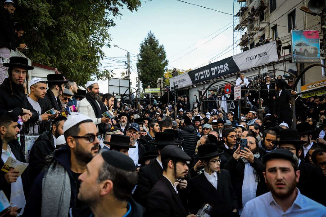 Jewish men in the street near the tomb of Rabbi Nachman of Breslov in Uman on eve of Rosh Hashanah, Sept. 25, 2022. Credit: Flash90.