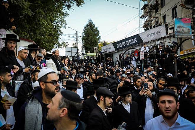 Jewish men in the street near the tomb of Rabbi Nachman of Breslov in Uman on eve of Rosh Hashanah, Sept. 25, 2022. Credit: Flash90.