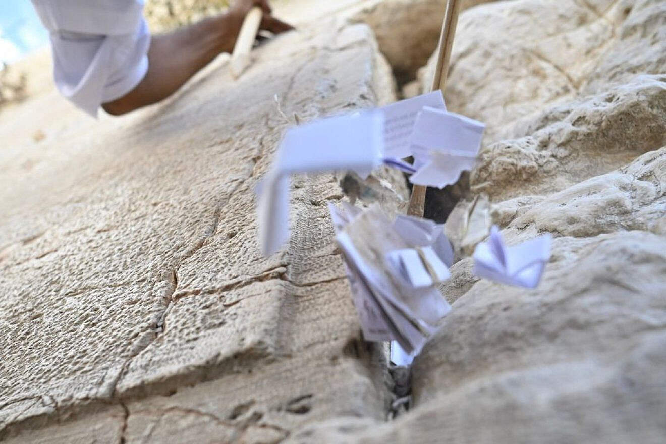 Notes are removed from the Western Wall ahead of Rosh Hashanah, Sept. 10, 2023. Photo by Yoav Dudkevitch/TPS.