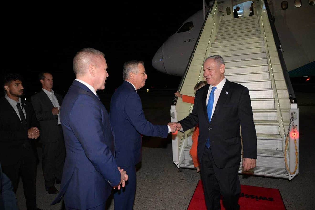 Israeli Prime Minister Benjamin Netanyahu greets Israeli Ambassador to the United States Michael Herzog (second from left) and Israeli Ambassador to the United Nations Gilad Erdan upon his arrival in New York on Sept. 19, 2023. Photo by Avi Ohayon/GPO.