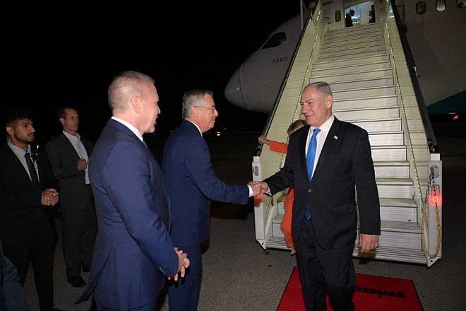 Israeli Prime Minister Benjamin Netanyahu greets Israeli Ambassador to the United States Michael Herzog (second from left) and Israeli Ambassador to the United Nations Gilad Erdan upon his arrival in New York on Sept. 19, 2023. Photo by Avi Ohayon/GPO.