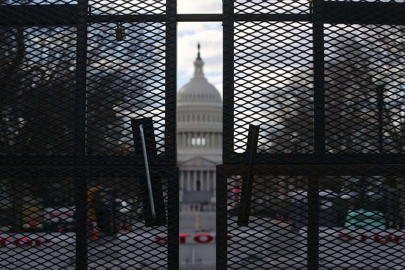 A metal fence surrounds the U.S. Capitol complex on March 6, 2021, two months to the day after rioters stormed the building. Credit: Philip Yabut/Shutterstock.