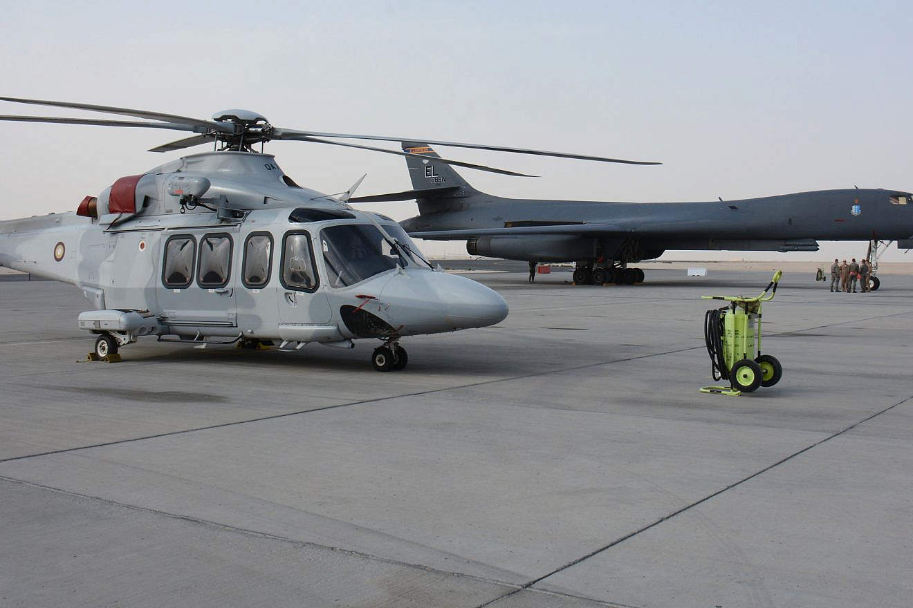 A Qatar Emiri Air Force helicopter and a U.S. Air Force B-1B Lancer at the annual Flight Line Fest at Al Udeid Air Base in Qatar, on Jan. 10, 2016. Credit: U.S. Air Force Photo by Tech. Sgt. James Hodgman via Wikimedia Commons.