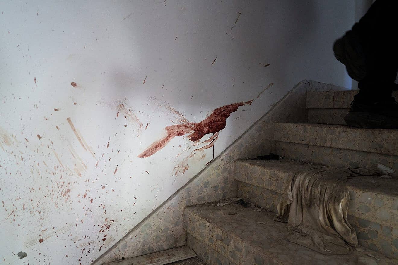 Inside a home in Kfar Aza, a kibbutz near in southern Israel, after Hamas terrorists infiltrated the border on Oct. 7, slaughtered civilians and wrecking their homes before dragging hostages back to the Gaza Strip, Oct. 15, 2023. Photo by Yaniv Nadav/Flash90.