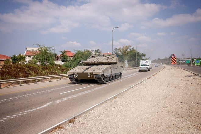 An IDF tank in southern Israel the day after the Hamas-led terror attacks, Oct. 8, 2023. Photo by Chaim Goldberg/Flash90.
