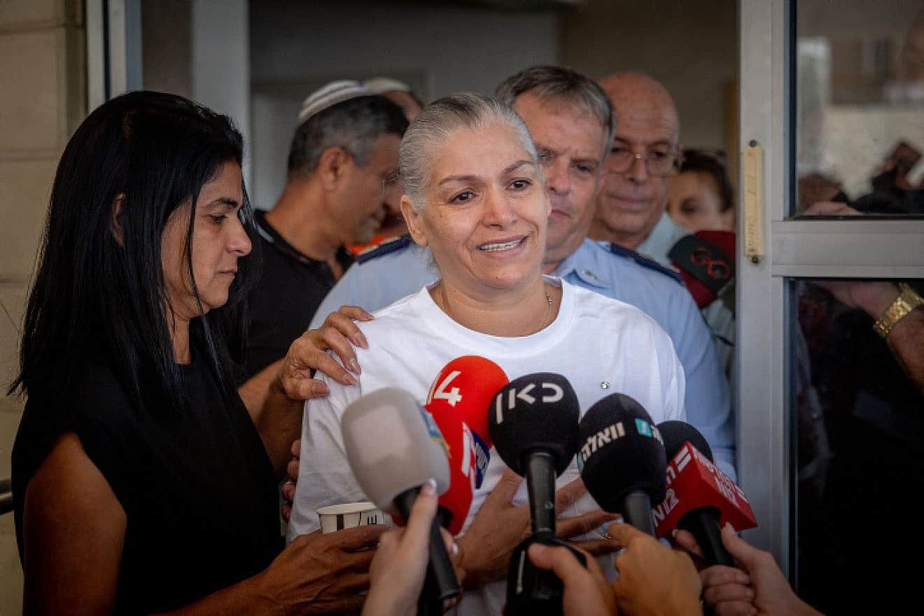 Margalit Megidish speaks to press outside her home in Kiryat Gat, Oct. 31, 2023. Photo by Yonatan Sindel/Flash90.