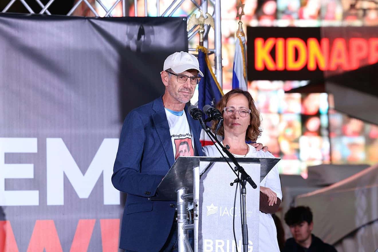 Ronen and Orna Neutra, whose son Omer was a hostage held by Hamas in the Gaza Strip, speak at a "Bring Them Home" rally sponsored by the Israeli-American Council in Times Square, in the heart of New York City, in support of as many as 200 additional hostages, Oct. 19, 2023. Credit: IAC.