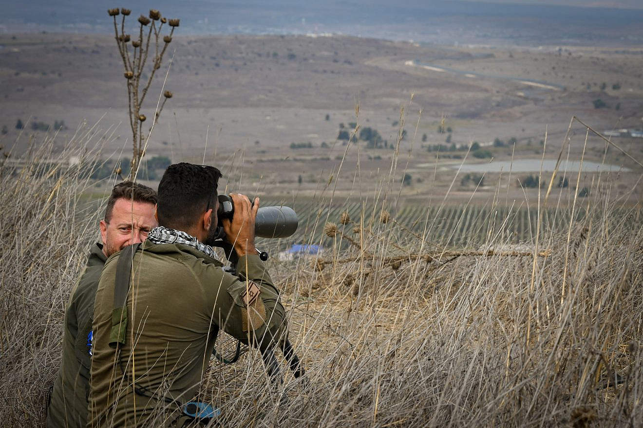 Israeli soldiers watch the Syrian side of the border in the Golan Heights in northern Israel on Oct. 30, 2023. Photo by Michael Giladi/Flash90.