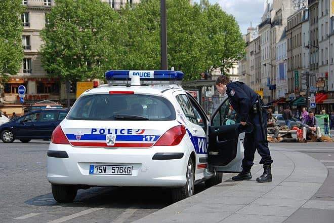 Police car in Paris. Photo by Andre Bulber/Wikimedia Commons.