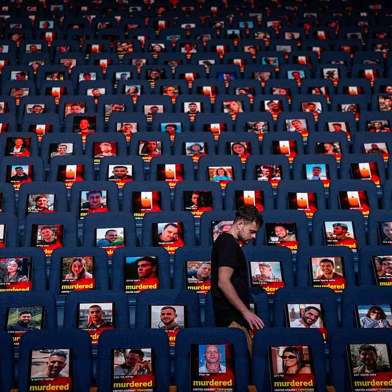 Photos of more than 1,000 people abducted, missing and/or killed in the Hamas terrorist attacks on Oct. 7 in southern Israel are being displayed in the Smolarz Auditorium at Tel Aviv University, Oct. 22, 2023. Photo by Yonatan Sindel/Flash90.