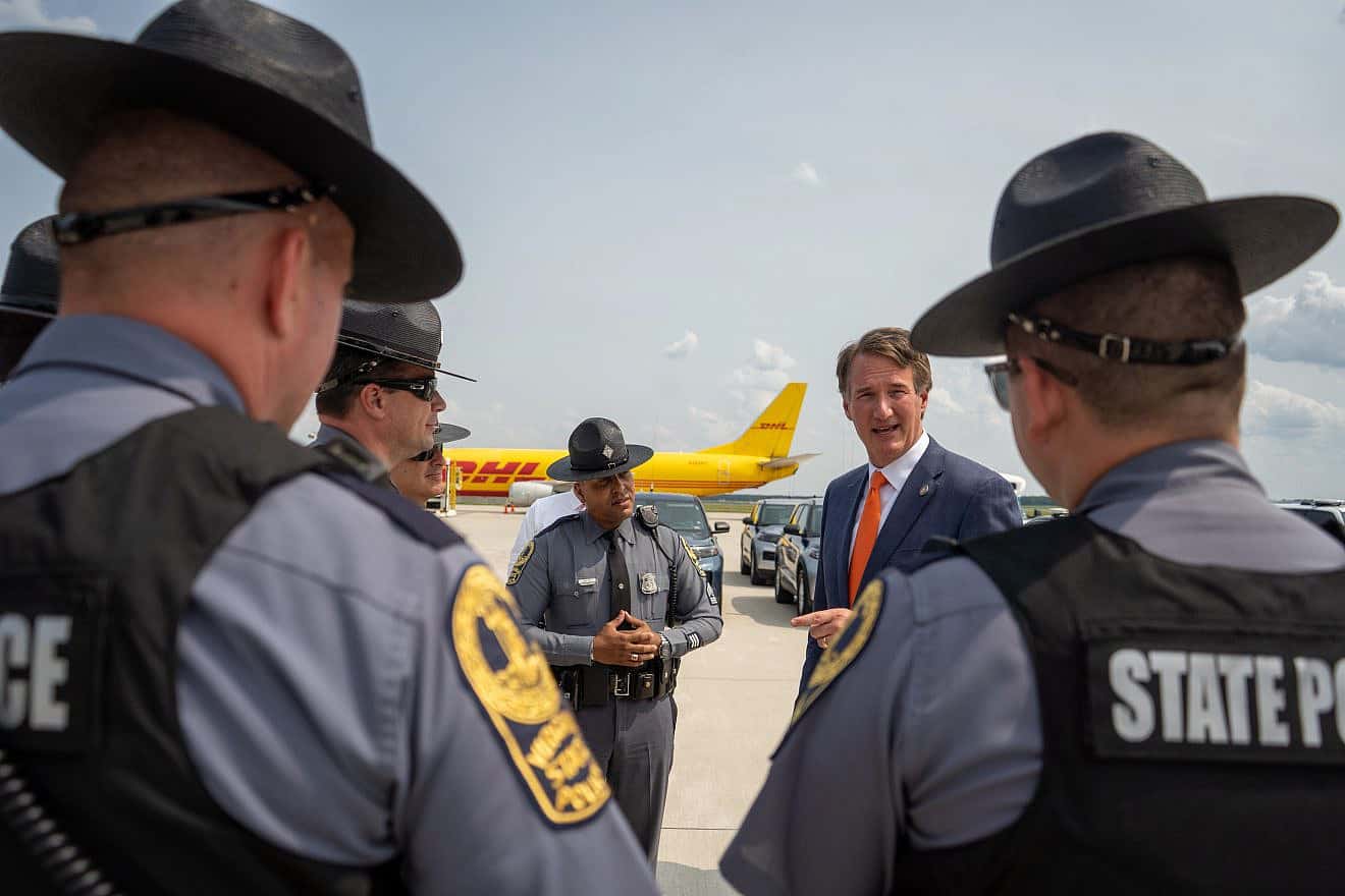 Virginia Gov. Glenn Youngkin with State Police on Aug. 1, 2023. Credit: Official Photo by the Office of Governor Glenn Youngkin via Wikimedia Commons.