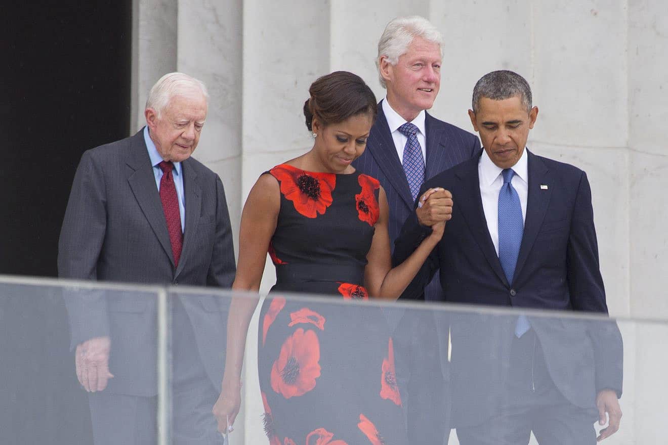 (From left) Former President Jimmy Carter, then-first lady Michelle Obama, former President Bill Clinton, and then-President Barack Obama at the 50th anniversary of the March on Washington for Jobs and Freedom Aug. 28, 2013. Credit: Joseph Sohm/Shutterstock.