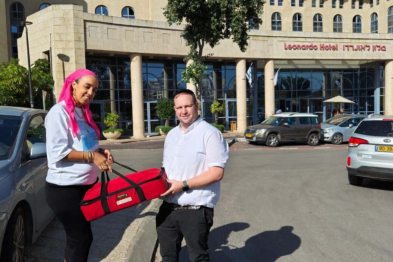 JCT's Netanel Fuxbrumer delivers first aid kits as part of the school's initiative to help those impacted by the war. Photo courtesy of JCT.
