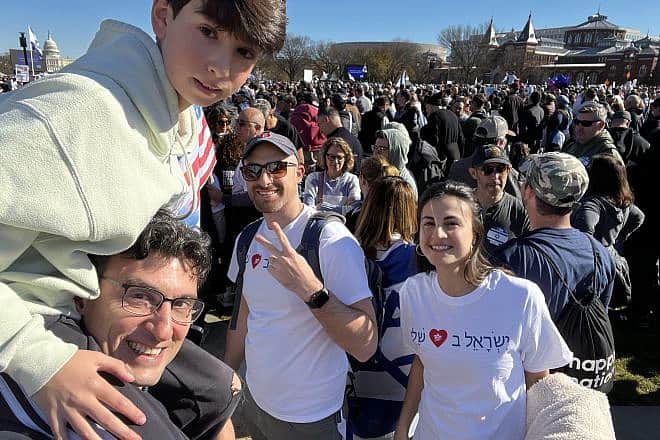 Itai Yanai (with son Ben on his shoulders), and Shelli Robbins and Noam Bar-Touv, at the “March for Israel” on the National Mall in Washington, D.C., on Nov. 14, 2023. Credit: Courtesy of Itai Yanai.