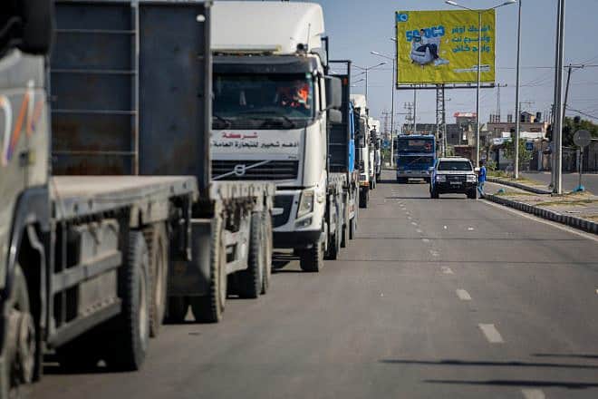 Trucks with humanitarian aid for Palestinian civilians arrive at the Gaza side of the Rafah border crossing with Egypt, Oct. 21, 2023. Photo by Atia Mohammed/Flash90.