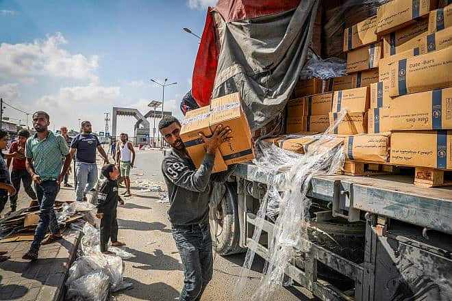 Trucks with humanitarian aid arrive in southern Gaza via the Rafah border crossing from Egypt, Nov. 2, 2023. Photo by Abed Rahim Khatib/Flash90.