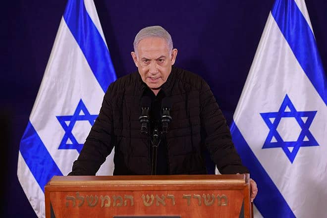 Israeli Prime Minister Benjamin Netanyahu, Defense Minister Yoav Galant and Minister-without-Portfolio Benny Gantz hold a joint press conference at the Ministry of Defense in Tel Aviv, Nov. 11, 2023. Photo by Marc Israel Sellem/Pool.