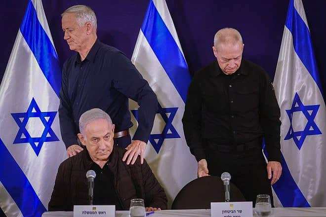 Prime Minister Benjamin Netanyahu, Defense Minister Yoav Gallant (left) and War Cabinet Minister Benny Gantz hold a press conference at the Defense Ministry in Tel Aviv, Nov. 11, 2023. Photo by Marc Israel Sellem/POOL.