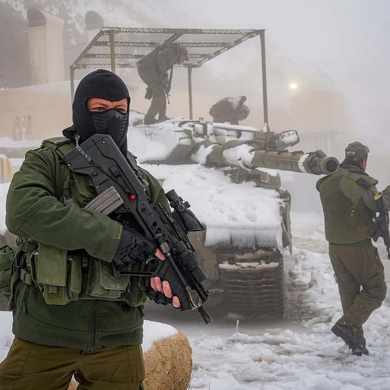 Israeli soldiers patrol on Mount Hermon, near the borders with Syria and Lebanon, Nov. 20, 2023. Photo by Ayal Margolin/Flash90.