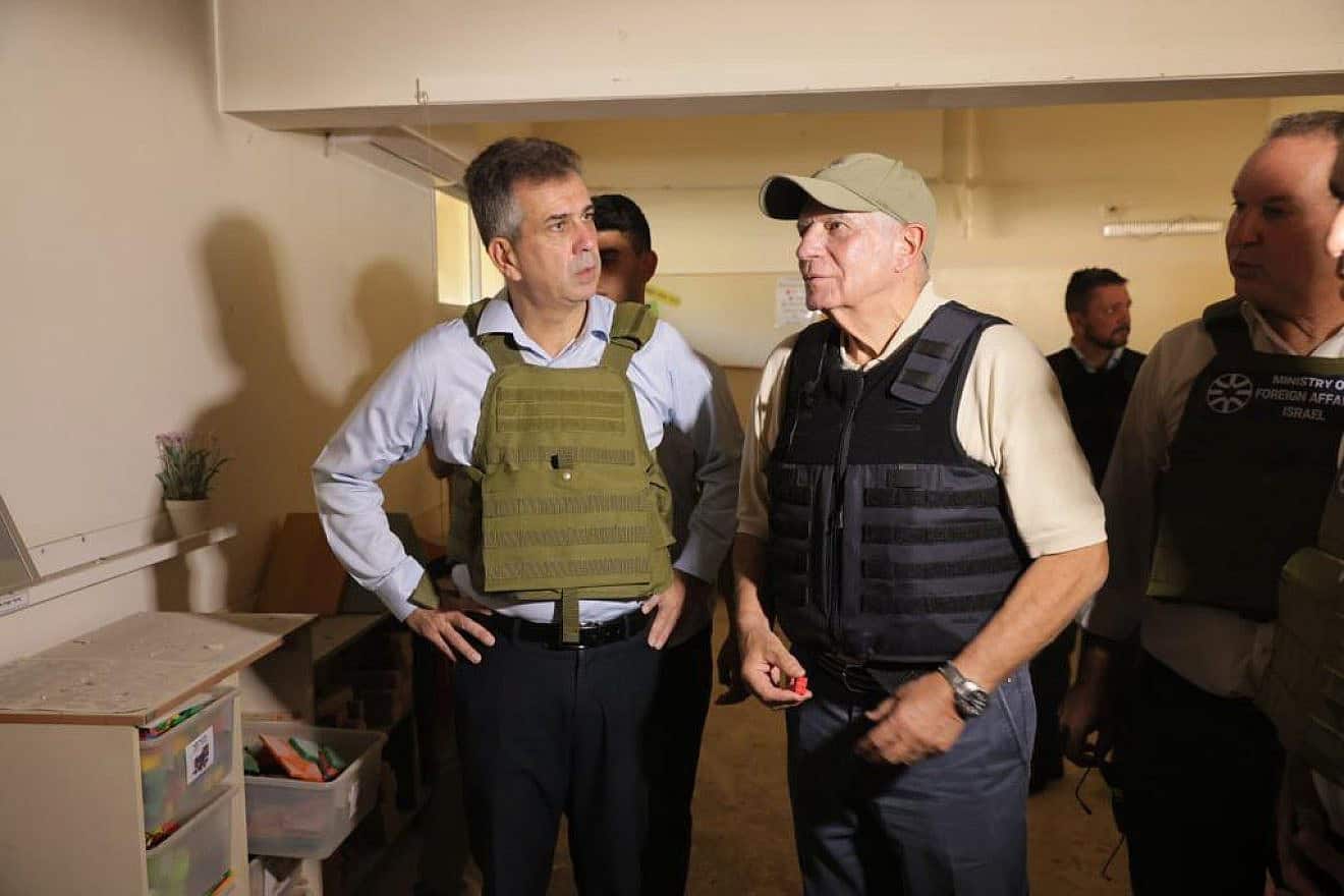 Israeli Foreign Minister Eli Cohen (left) and European Union High Representative for Foreign Affairs Josep Borrell visit Kibbutz Be'eri, Nov. 16, 2023. Credit: Israeli Foreign Ministry.