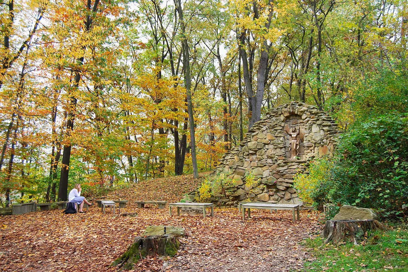 Enjoying a quiet moment at the Marian Grotto of the Franciscan University of Steubenville, Ohio. Credit: Esther Kolis/Shutterstock.
