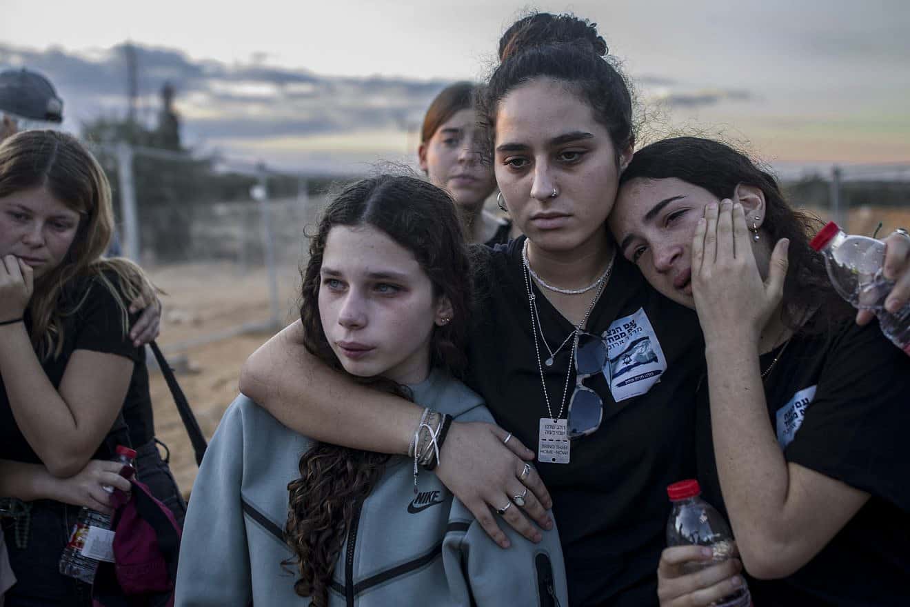 Friends of Liel and Yanai Hetzroni attend their funeral at Kibbutz Revivim, Nov. 15, 2023. Photo by Rina Castelnuovo.