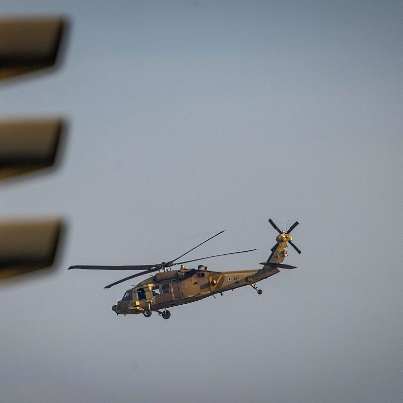 An Israeli military helicopter flies near the border with the Gaza Strip on Nov. 1, 2023. Photo by Chaim Goldberg/Flash90.
