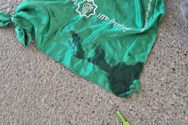 Israeli forces foiled a terrorist attack by neutralizing a Palestinian woman wrapped in a Hamas flag and armed with a knife at the Qalandiya crossing near Jerusalem, Nov. 7, 2023. Credit: Israel Police.