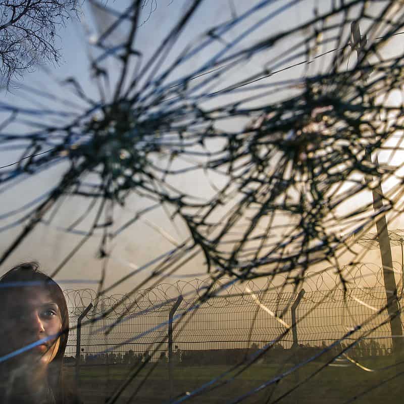 Michelle Mari inspects the aftermath of Hamas's Oct. 7 massacre in her community of Kibbutz Nirim, Nov. 26, 2023. Photo by Rina Castelnuovo.
