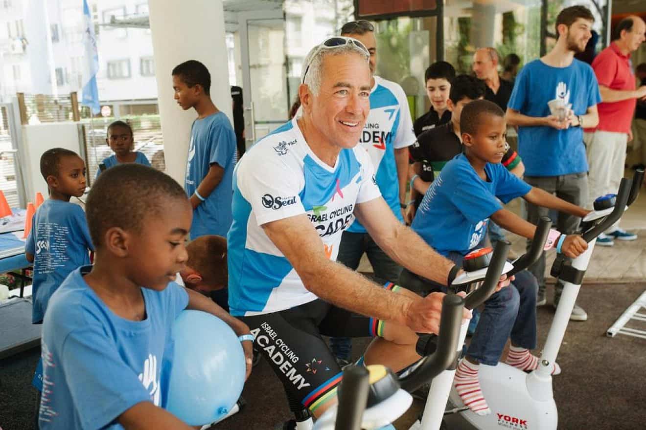 Sylvan Adams with children brought to Israel for emergency medical treatment with Save A Child’s Heart at ​the Sylvan Adams Emergency Hospital wing at Tel Aviv Sourasky Medical Center (Ichilov Hospital). Credit: Courtesy of SACH.