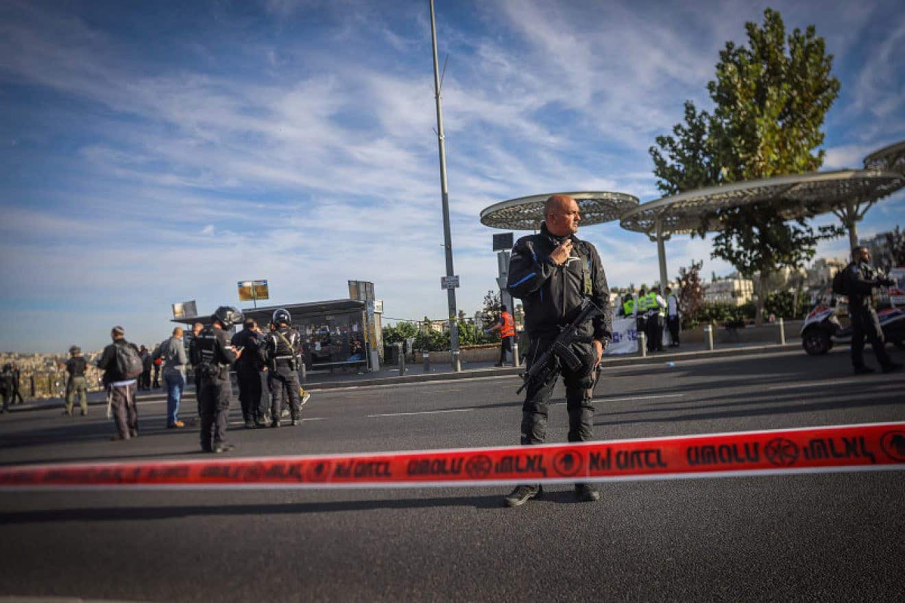 Israeli security forces at the scene of a Palestinian shooting attack at the entrance to Jerusalem, Nov. 30, 2023. Photo by Chaim Goldberg/Flash90.