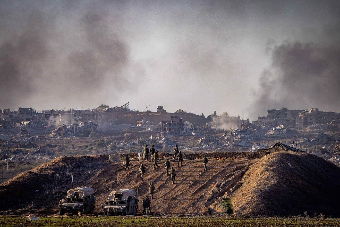 Israeli soldiers take position on the border fence with the Gaza Strip in southern Israel on Dec. 11, 2023. Photo by Chaim Goldberg/Flash90.