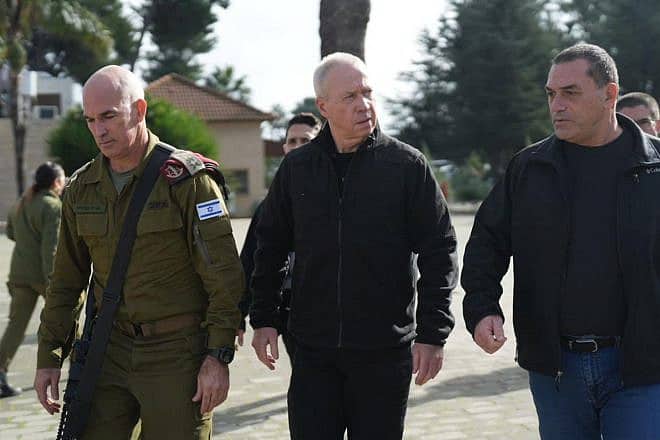 OC Northern Command Maj. Gen. Ori Gordin (left) and Defense Minister Yoav Gallant (center) arrive for a situation assessment at Northern Command HQ in Safed, Dec. 25, 2023. Photo by Elad Malka.
