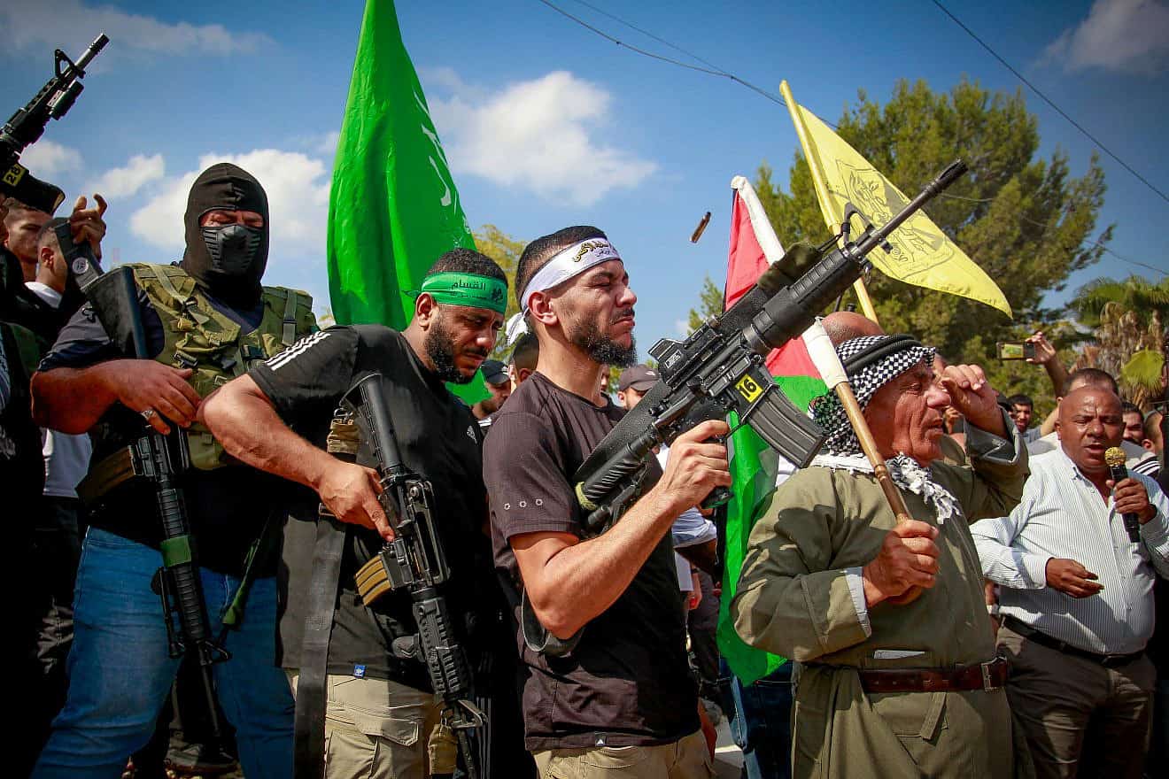 Terrorists attend the funeral of a Palestinian who was killed in an Israeli raid in the Nur Shams refugee camp, east of Tulkarm, Oct. 20, 2023. Photo by Nasser Ishtayeh/Flash90.