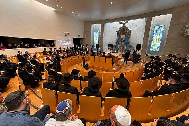 A Torah scroll hidden in the attic of a synagogue in Poland that was ransacked on Kristallnacht was placed in the Holy Ark at Yad Vashem, Dec. 21, 2023. Credit: Yad Vashem.