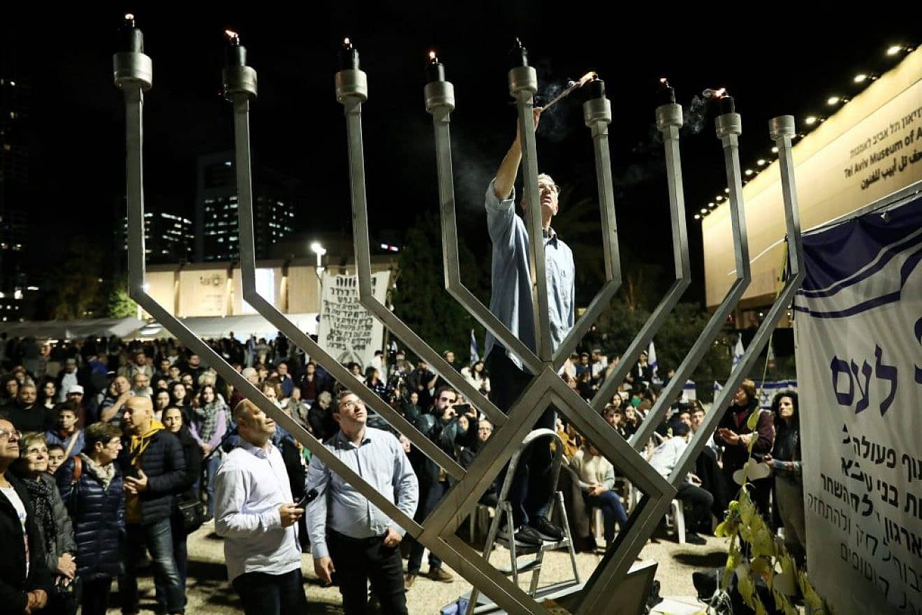 The families of Israeli hostages in Gaza at a Chanukah lighting ceremony in Tel Aviv, Dec. 13, 2023. Photo by Gideon Markowicz/TPS.